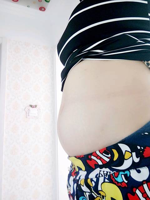肚子大还是小_怀孕19周了 大家帮忙看看我的肚