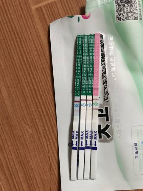 家帮忙看看!_今天是姨妈推迟的第四天,排卵试纸