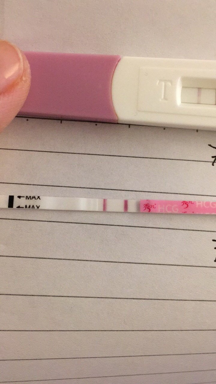 大家帮我看看。这样算阳性吗？